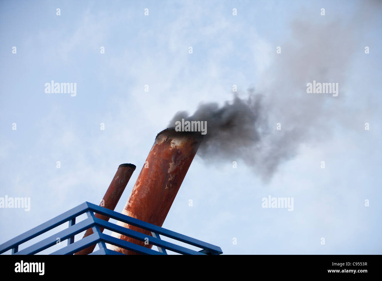 Exhaust emissions, burning marine diesel in a ships engine. Marine