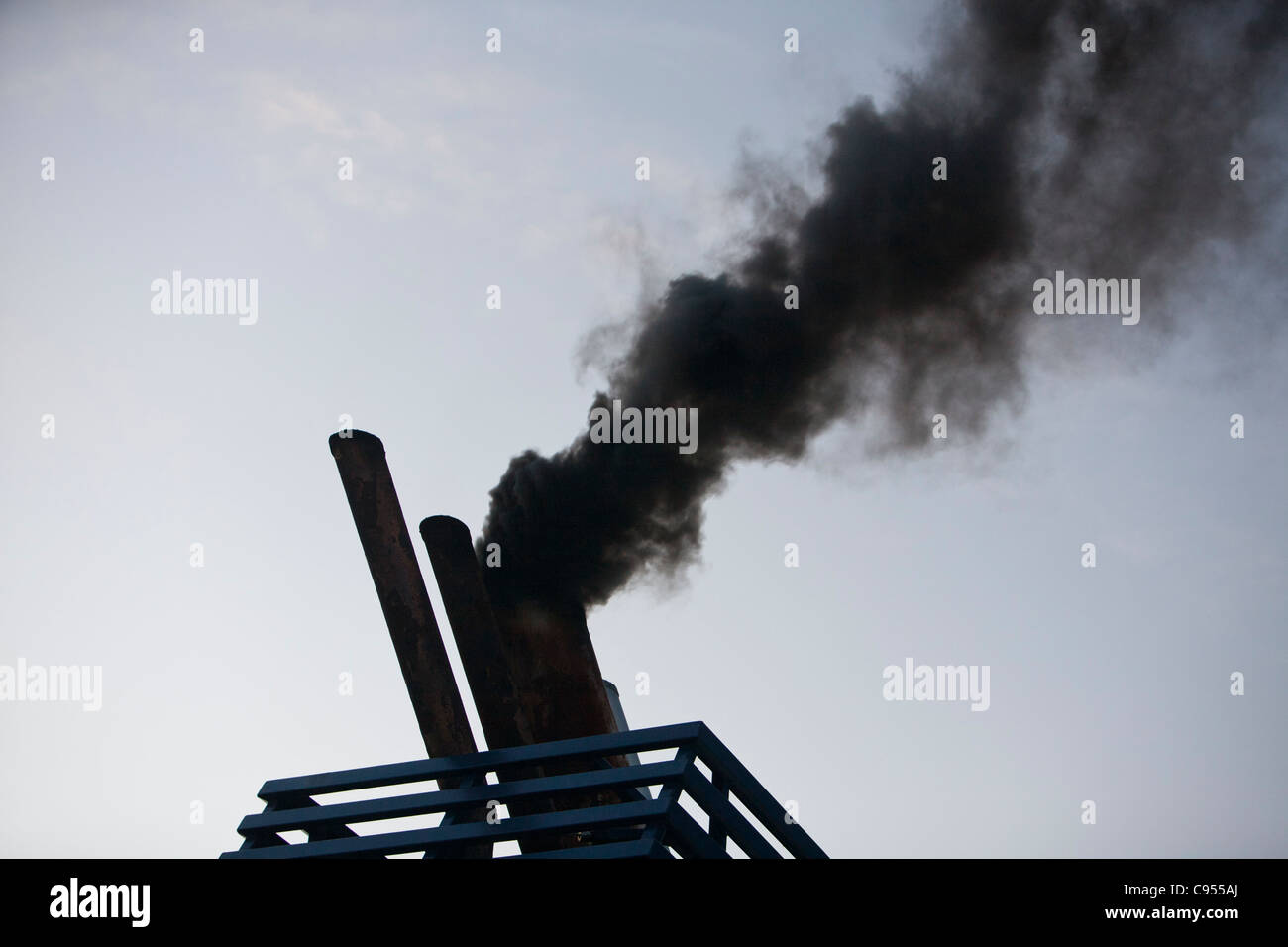 Exhaust emissions, burning marine diesel in a ships engine. Marine