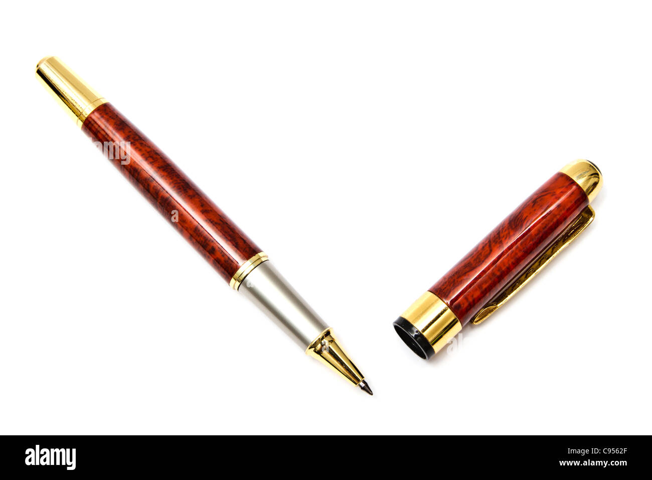 Red Ball Point Pen closeup On White background Stock Photo