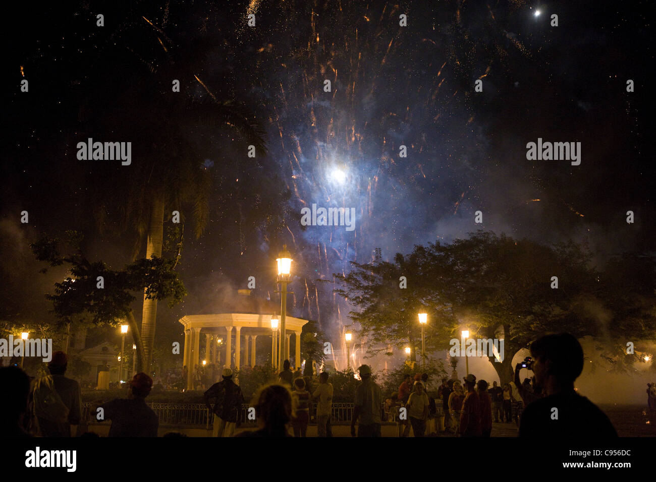 Las Parrandas de Remedios, Remedios, Cuba, Christmas Eve. Fireworks explode over the town's square well into the night of celebrations. Stock Photo