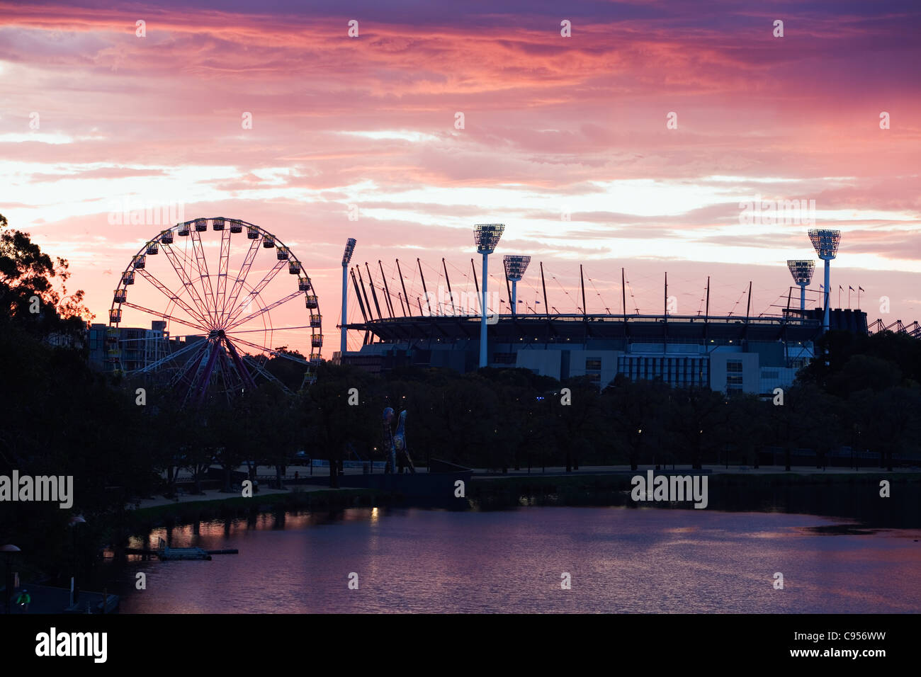 Dawn over the Melbourne Cricket Ground on the banks of the Yarra River in Melbourne, Victoria, Australia Stock Photo