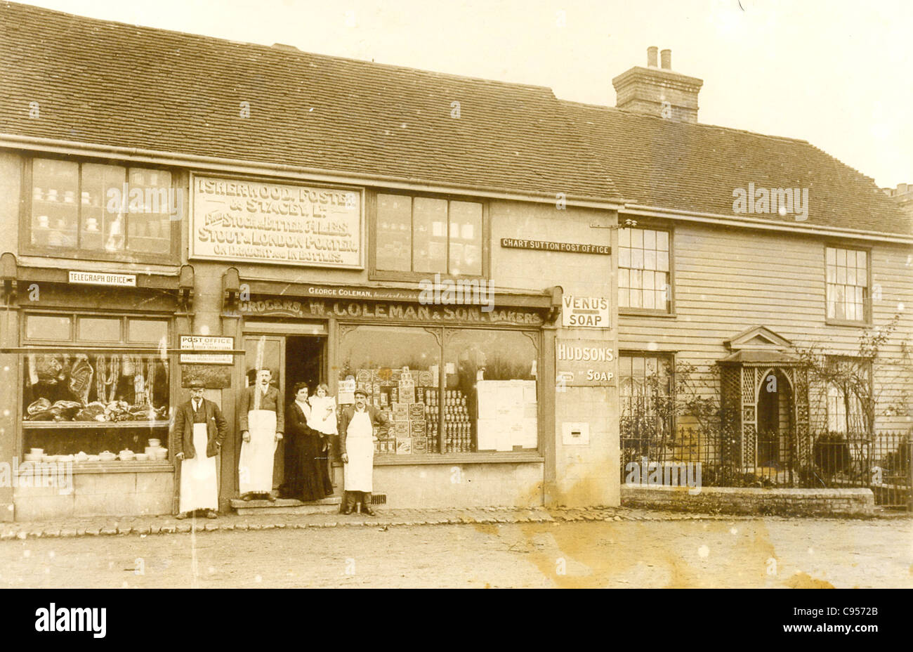The staff outside the Post Office and shop front at Chart Sutton licensed to George Coleman circa 1895 Stock Photo