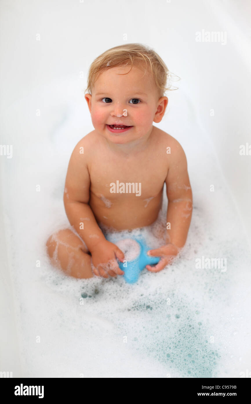 Toddler girl in the bath tub Stock Photo Alamy