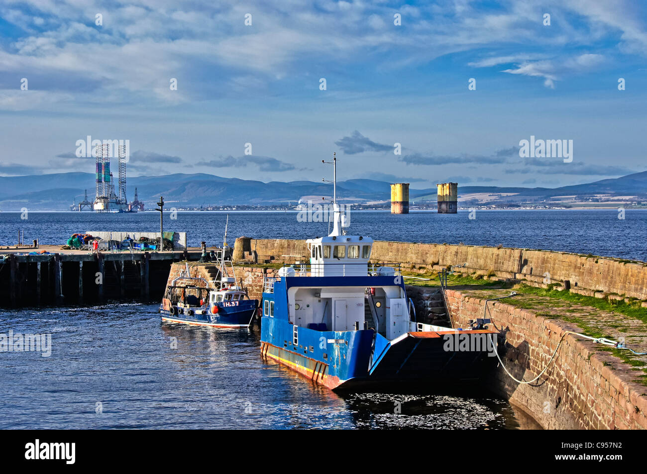 Nigg-Cromarty ferry Cromarty Queen & fishing boat in Cromarty Harbour ...