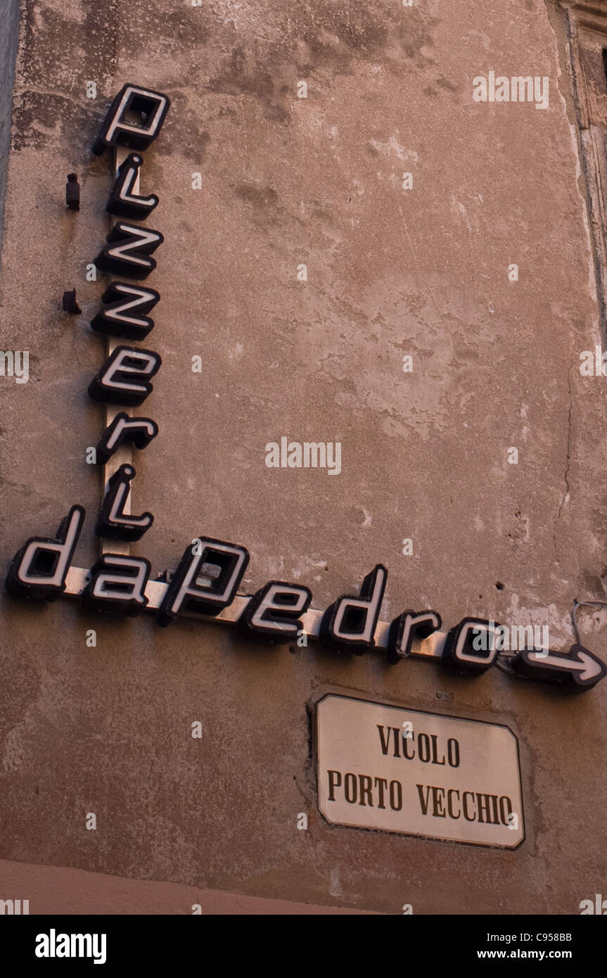 Pizzeria daPedro sign on building on Vicolo Porto Vecchio in Malcesine Italy. Stock Photo