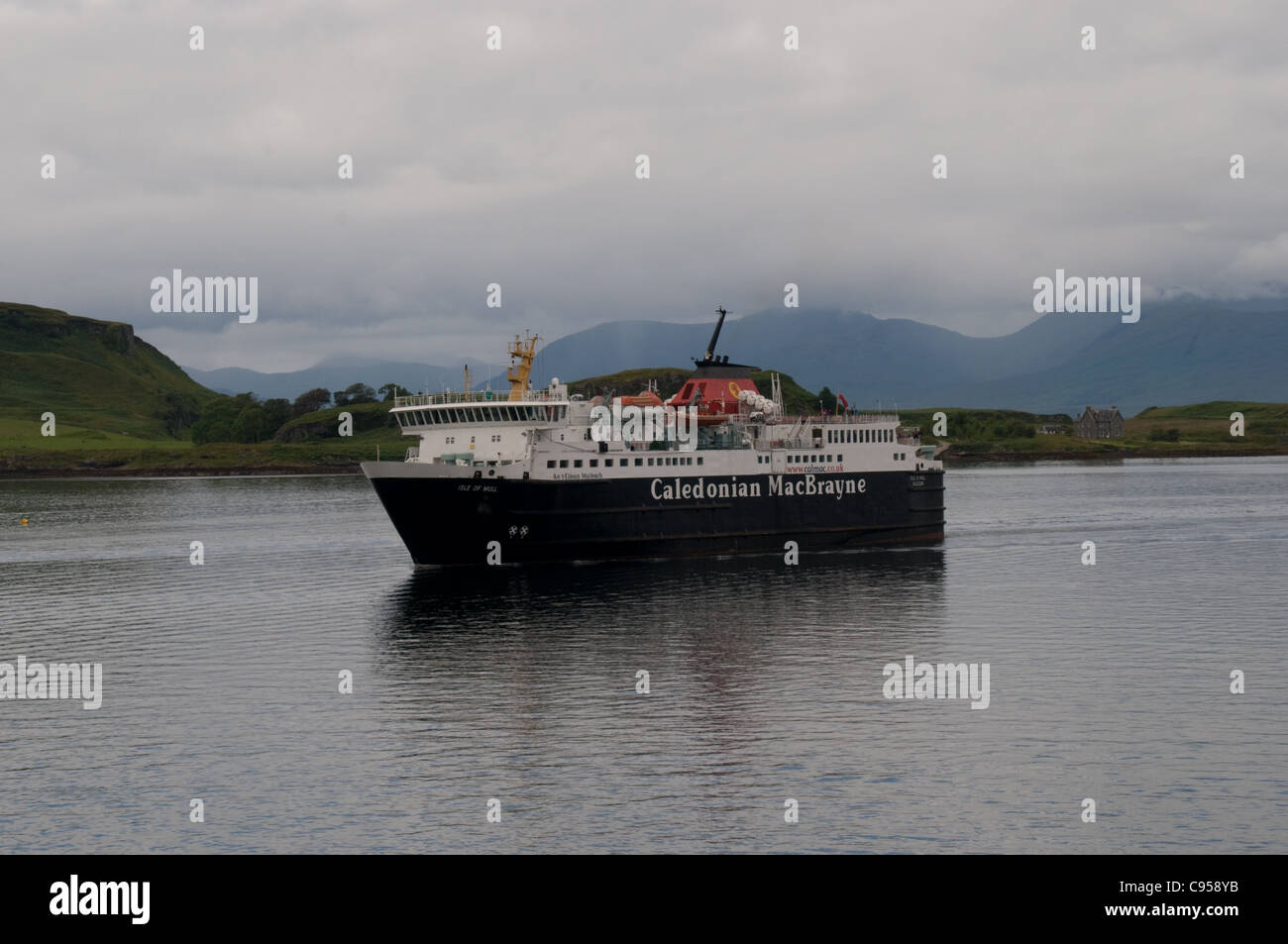 The Caledonian MacBrayne ferry Lord of the Isles sails towards Oban , Scotland Stock Photo