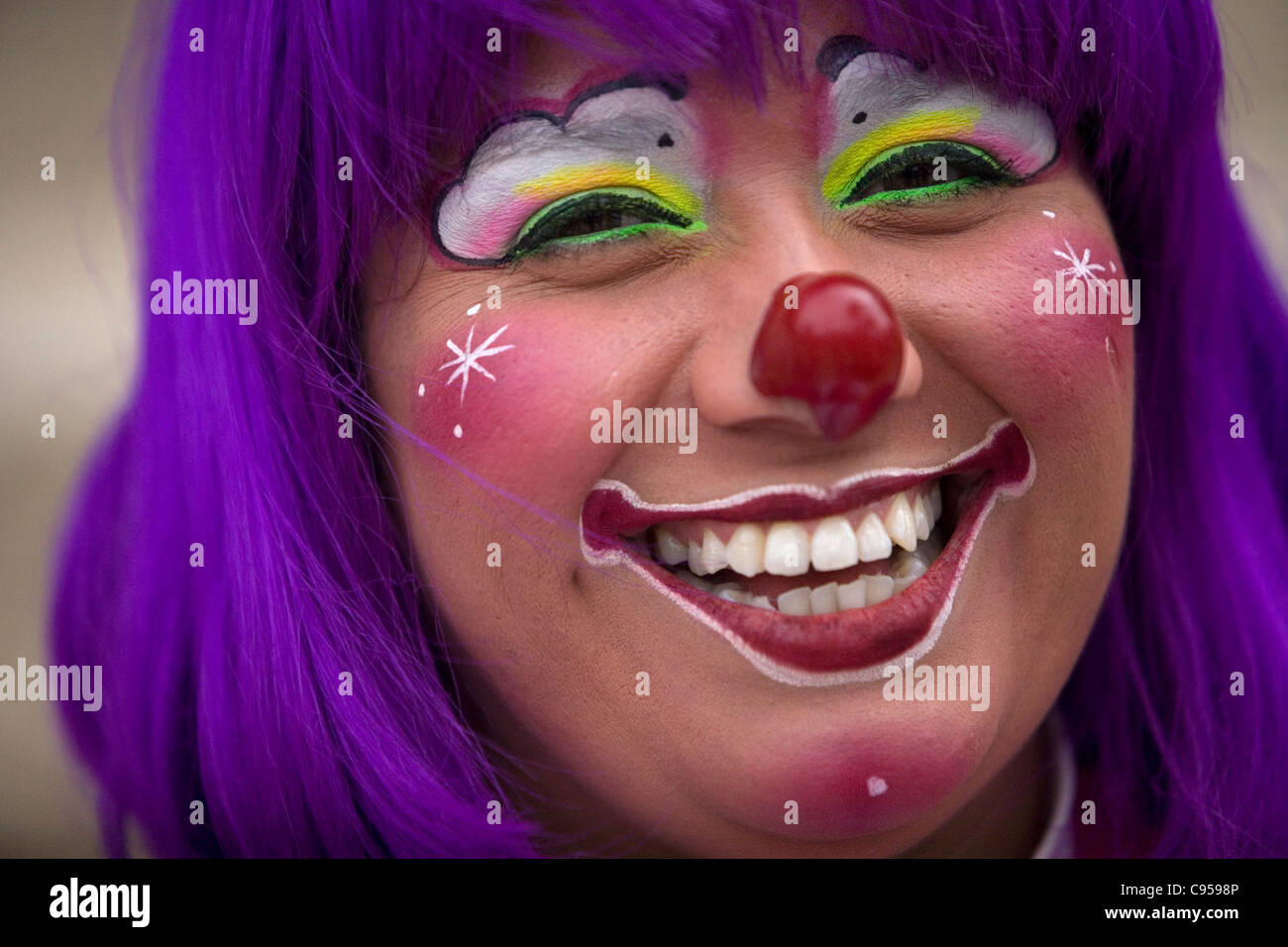 A female clown smiles during the 16th International Clown Convention