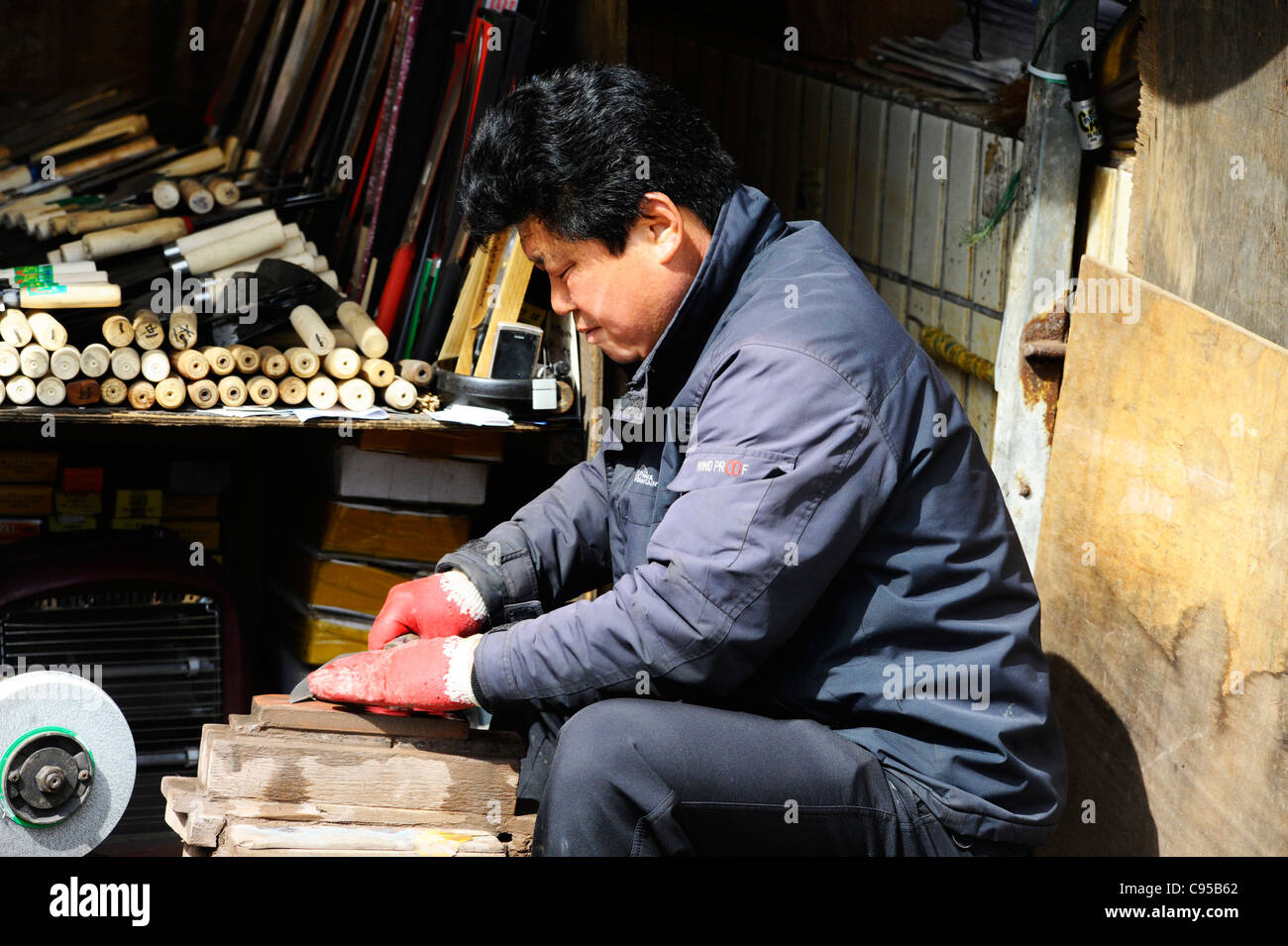 Sharpening knives in Busan, South Korea. Stock Photo