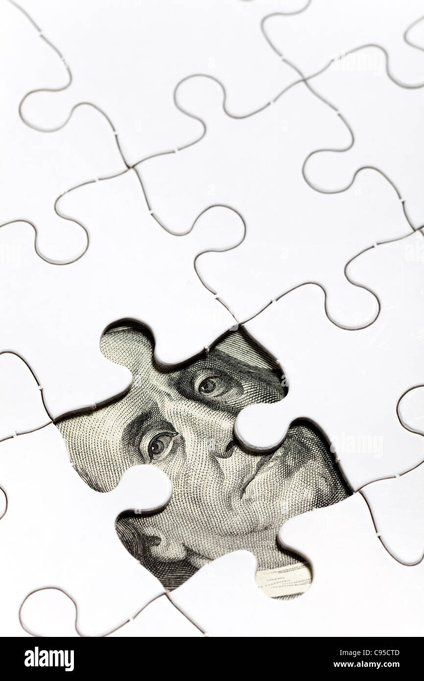 Dollar Puzzle, business concept of Solution Stock Photo Alamy