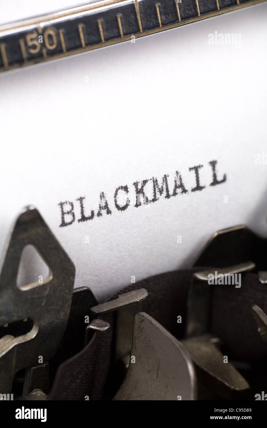 Typewriter close up shot, Concept of Blackmail Stock Photo