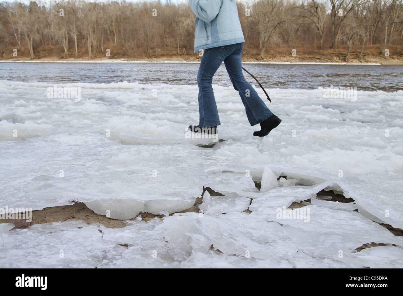 A girl walking on ice Stock Photo Alamy