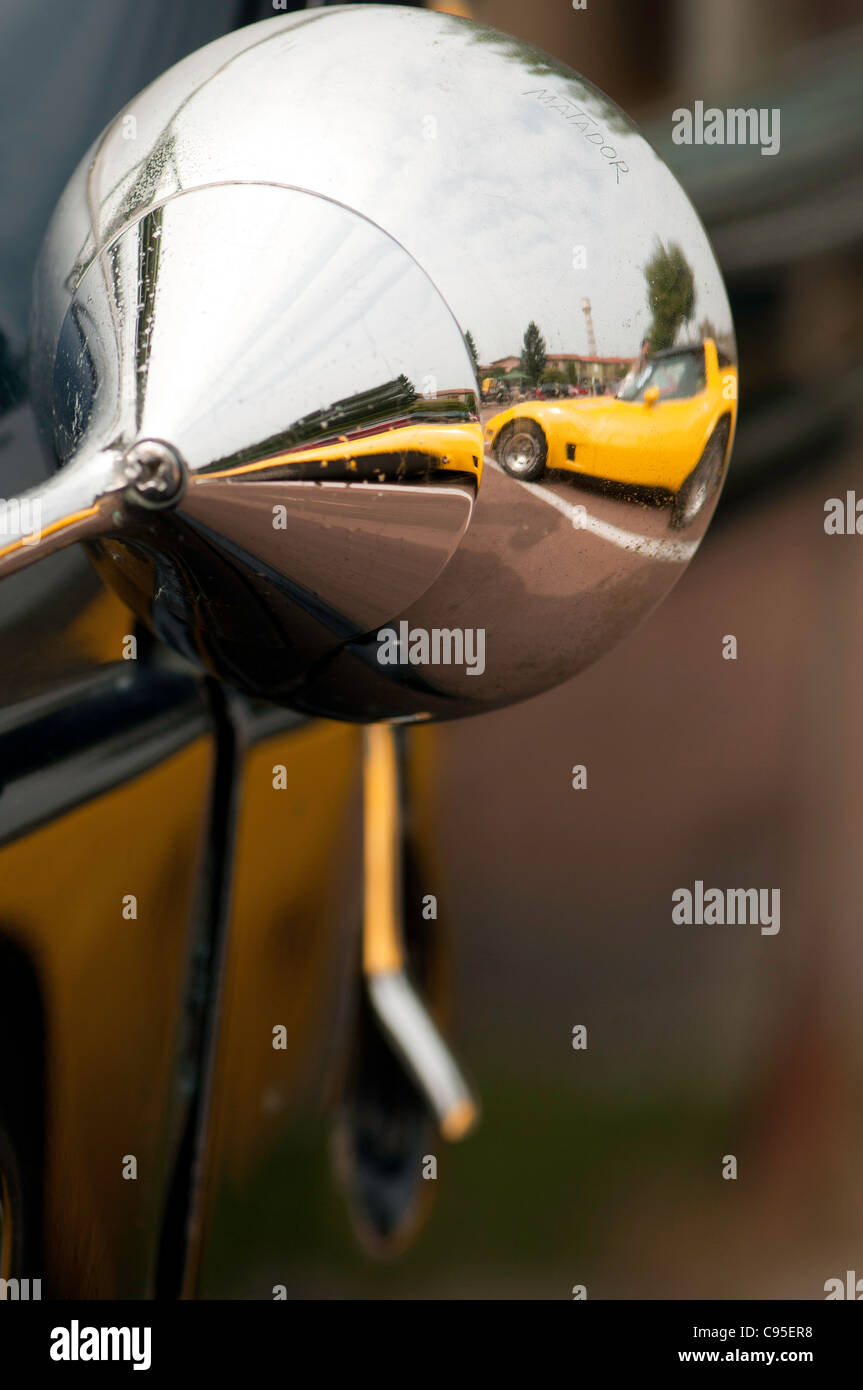Sport car reflects in a side mirror Stock Photo Alamy