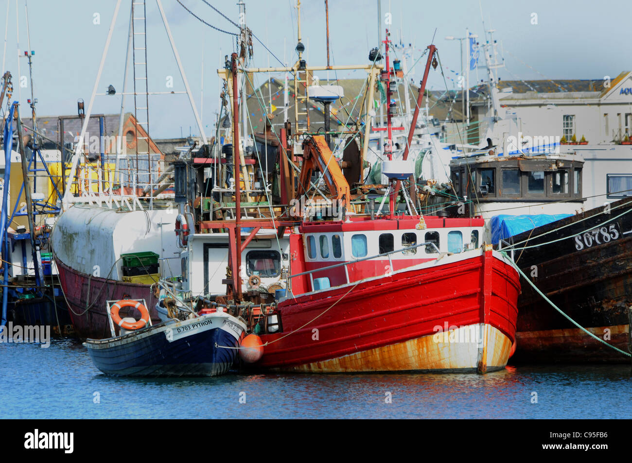 FISHING BOATS AT THE QUAYSIDE IN THE HARBOUR AT LOWTH, SOUTHERN IRELAND Stock Photo