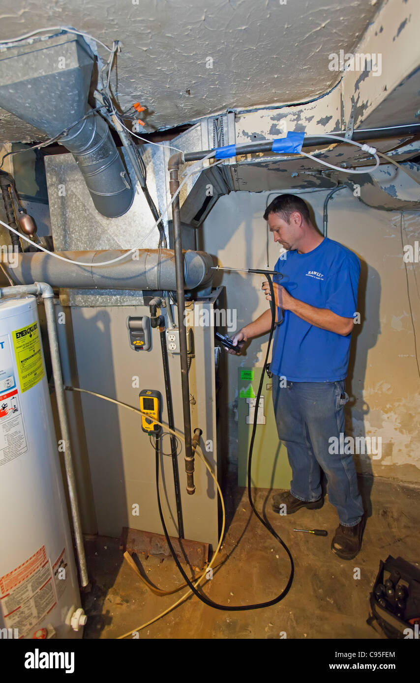 Technician Repairs Natural GasFired ForcedAir Furnace Stock Photo Alamy