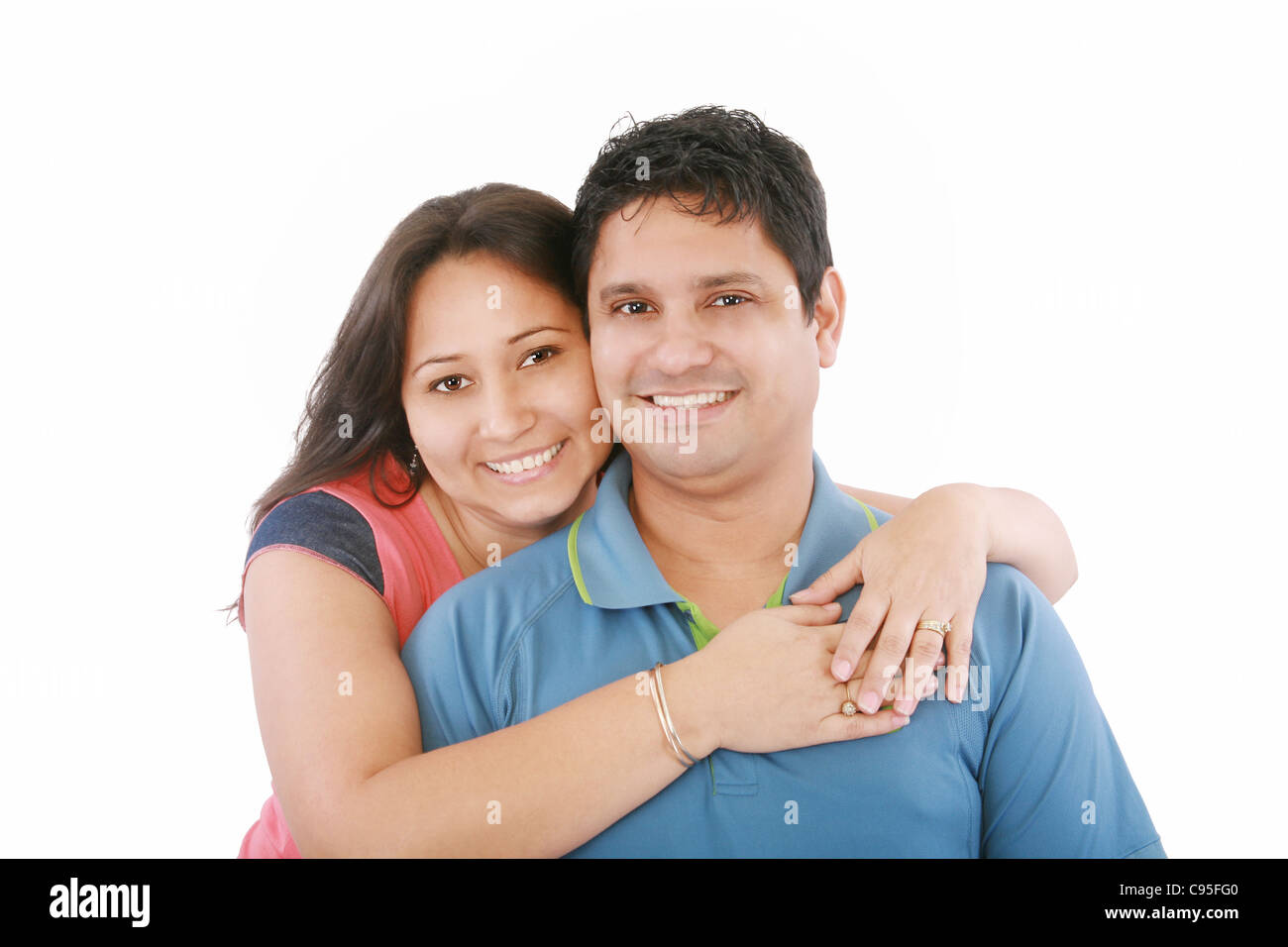 Portrait of a beautiful young happy smiling couple - isolated Stock ...