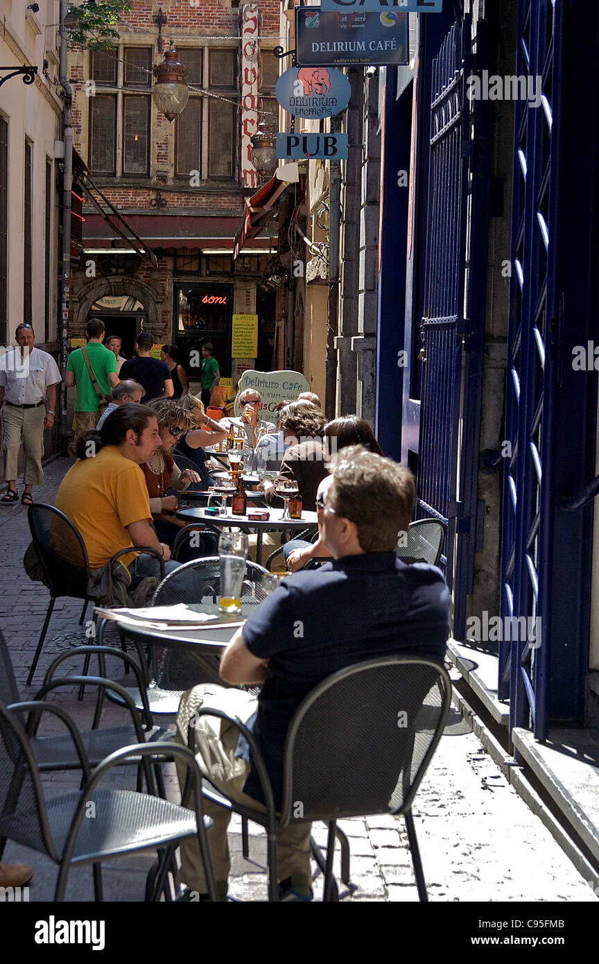 People sit outside at tables at the Delirium Tremens Pub, in Brussels, Belgium Stock Photo
