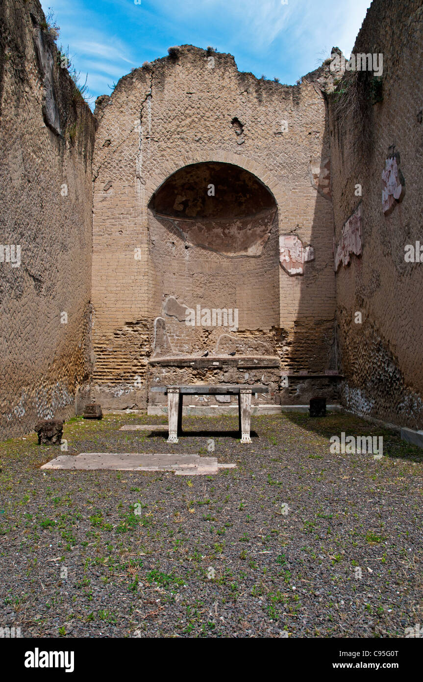 An apsidal room containing a marble platform which stands In the centre of the portico of the Palaestra, parallel to Cardo V Stock Photo