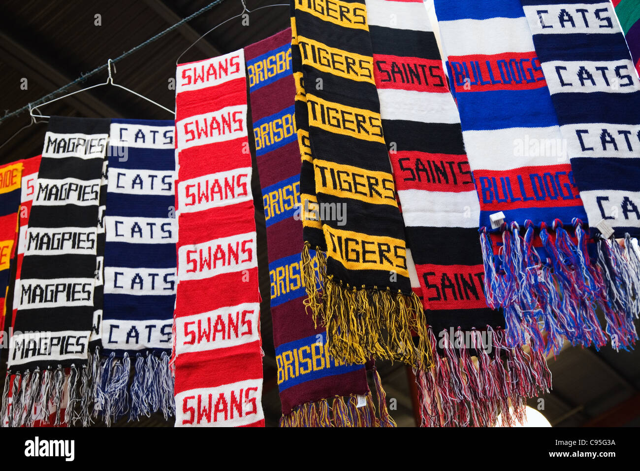 Australian Rules Football scarves for sale in Queen Victoria Market in Melbourne, Victoria, Australia Stock Photo