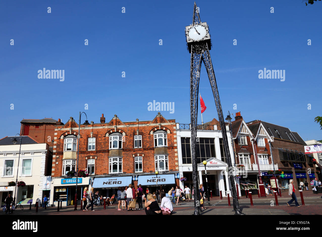 Millennium clock , Victoria Place shopping centre behind, Fiveways , Grosvenor Road, Royal Tunbridge Wells , Kent , England Stock Photo