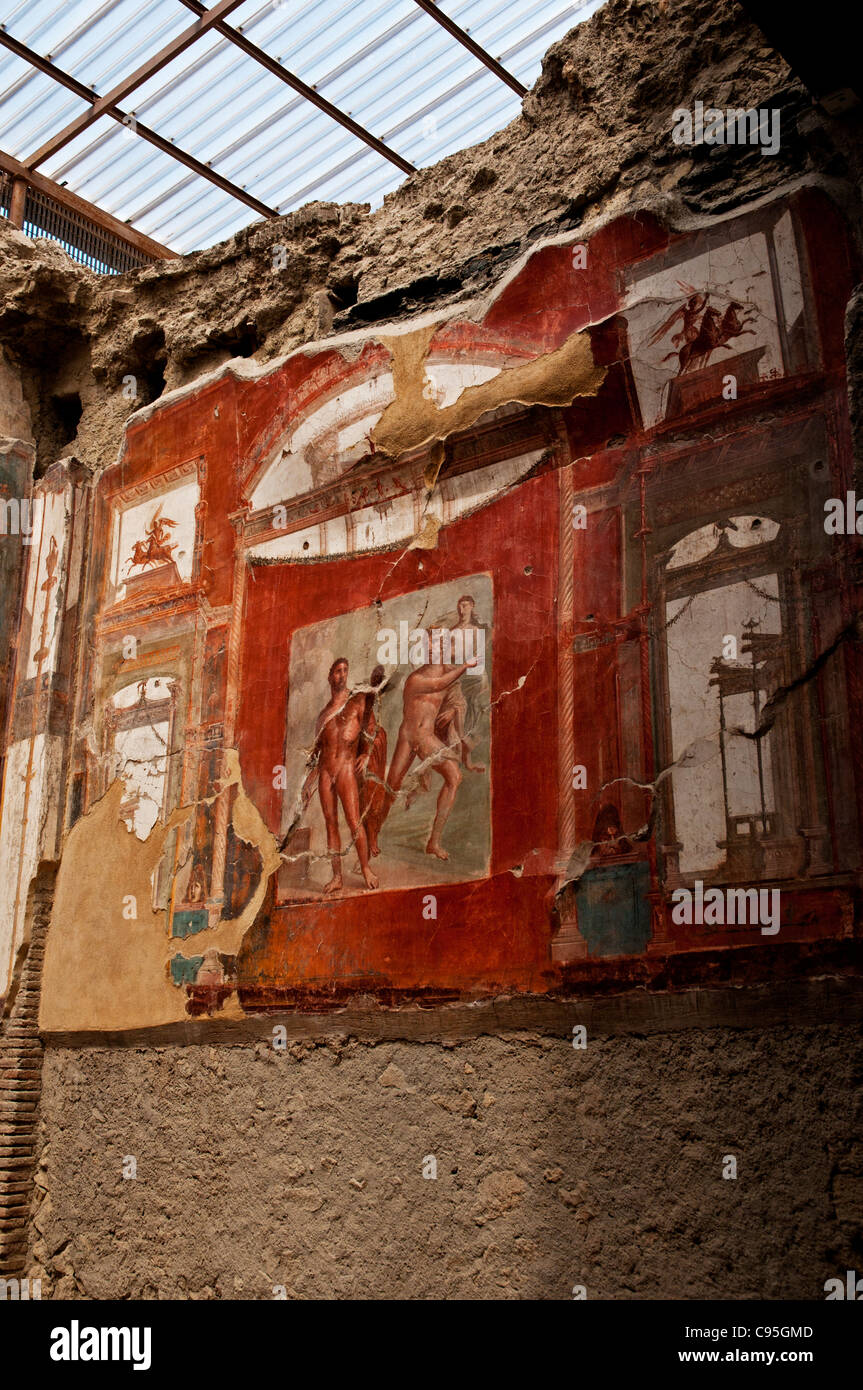 A fresco on the right wall of the sacellum in the College of the Augustali shows Hercules fighting Achelous, Herculaneum Stock Photo