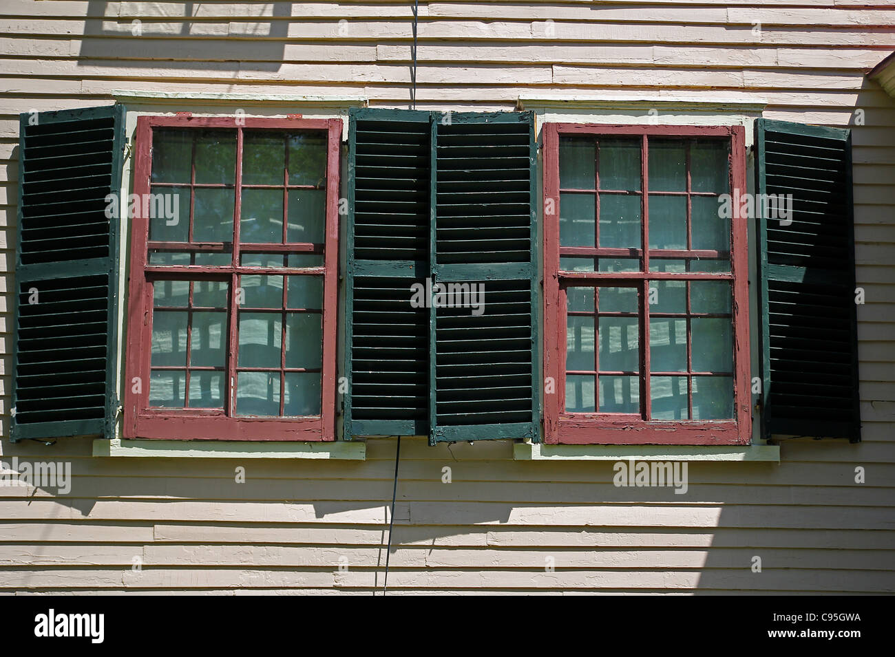 Windows of 'The Wayside,' the house where Louisa May Alcott, author of 'LIttle Women' lived as a teenager. Stock Photo