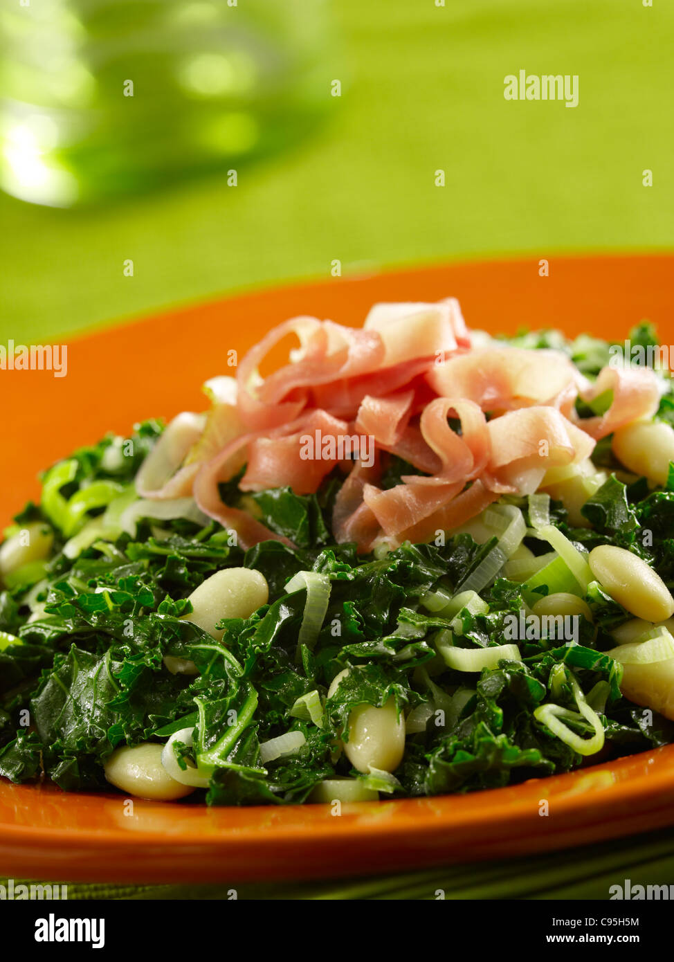 Sauteed kale with cannellini beans Stock Photo Alamy