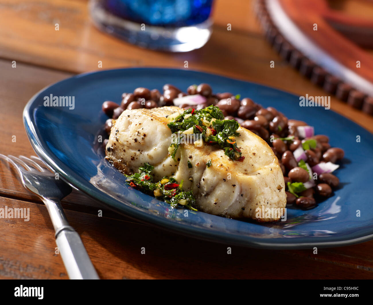 Sea bass served with beans Stock Photo