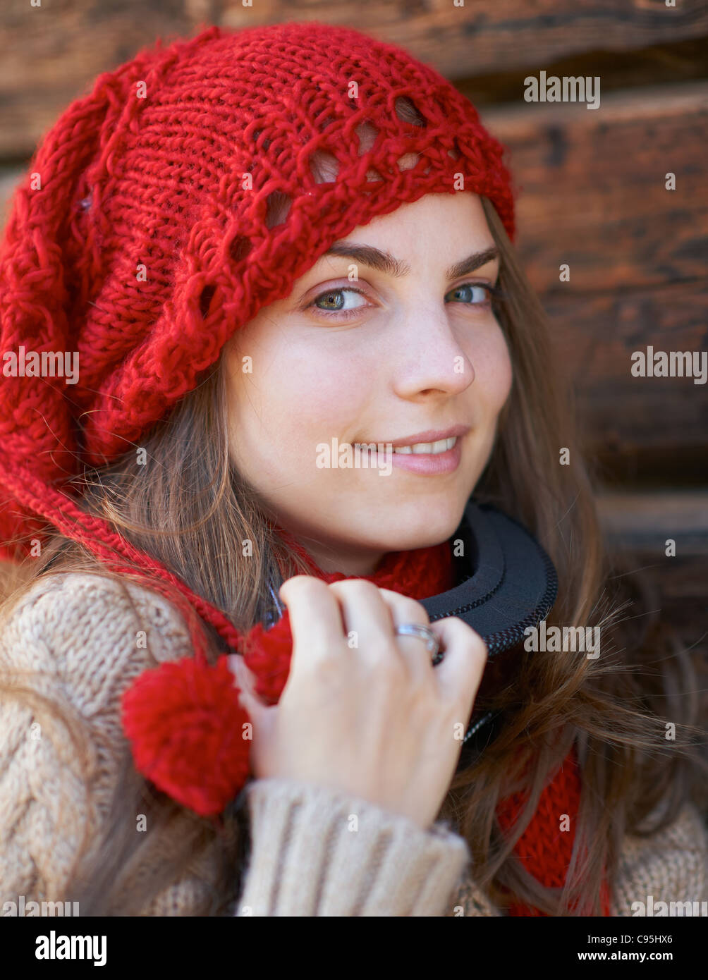 Portrait of a young girl wearing a red hat and sky glasses. Stock Photo