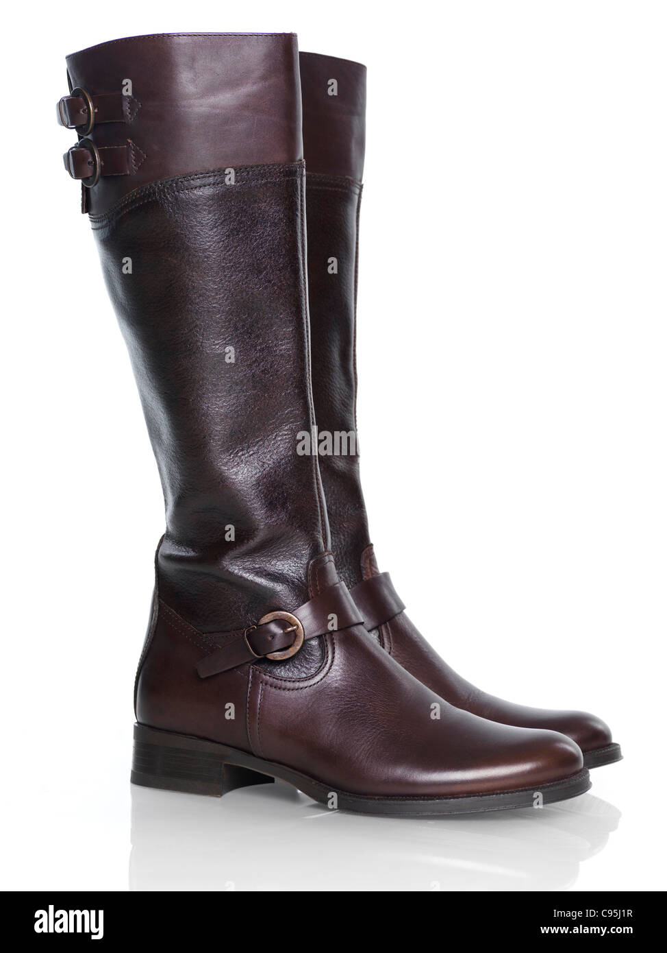 Knee-high brown leather fashion womens boots isolated on white background Stock Photo