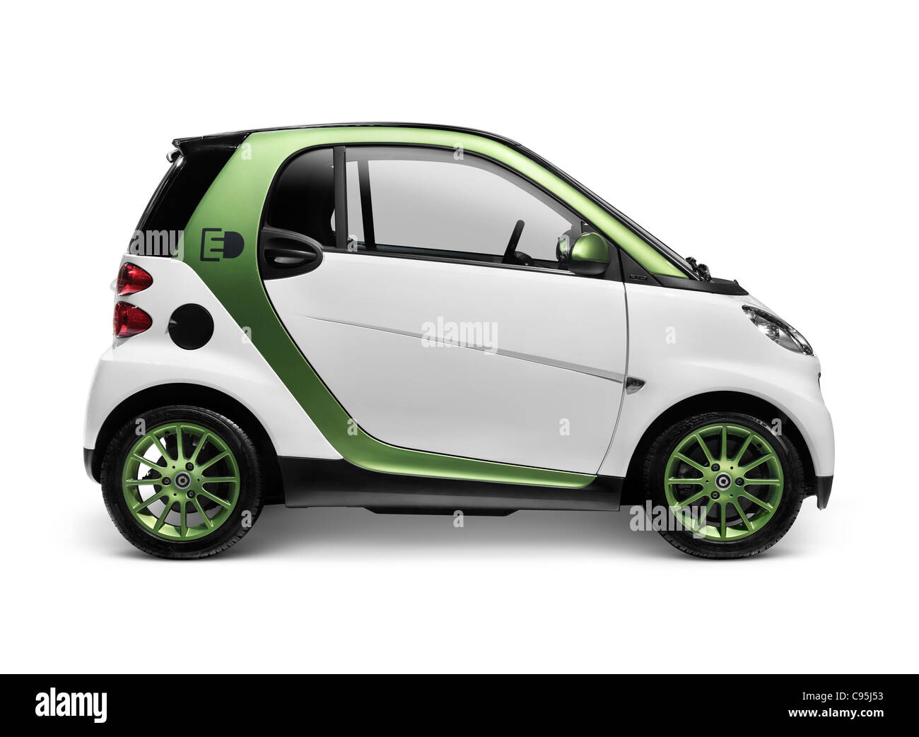 License available at MaximImages.com - Smart Fortwo Electric Drive - eSmart - Smart ED battery powered city car. Isolated on white background with cli Stock Photo