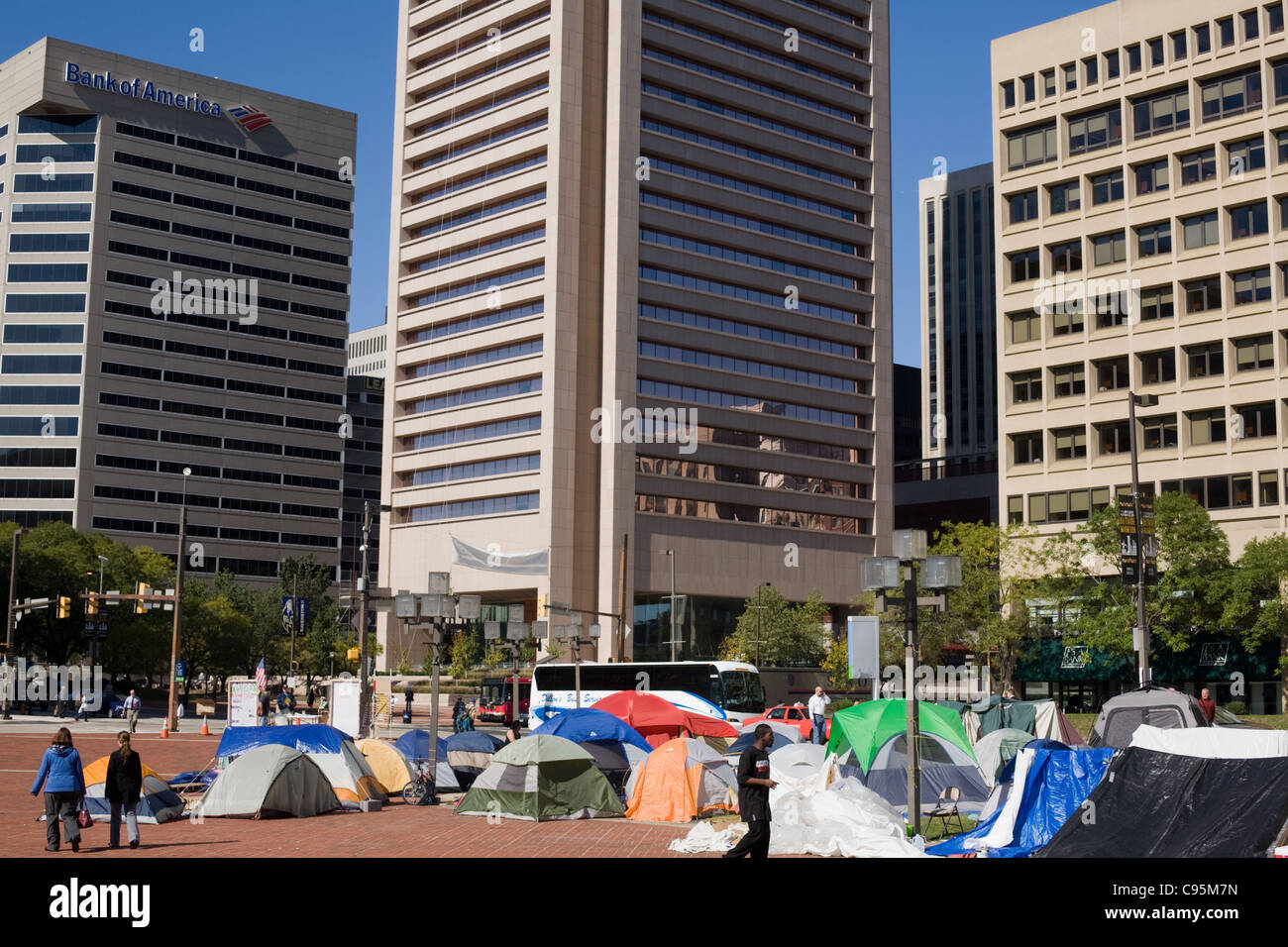 Tents under corporate skyscrapers, Occupy Baltimore protest, Inner Harbor, October 2011 Stock Photo