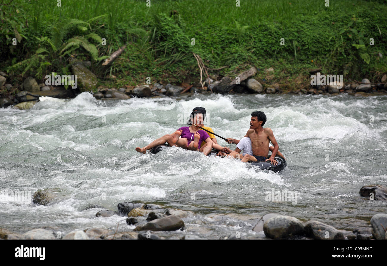 Tubing down the Bohorok River at Bukit Lawang in Gunung Leuser National