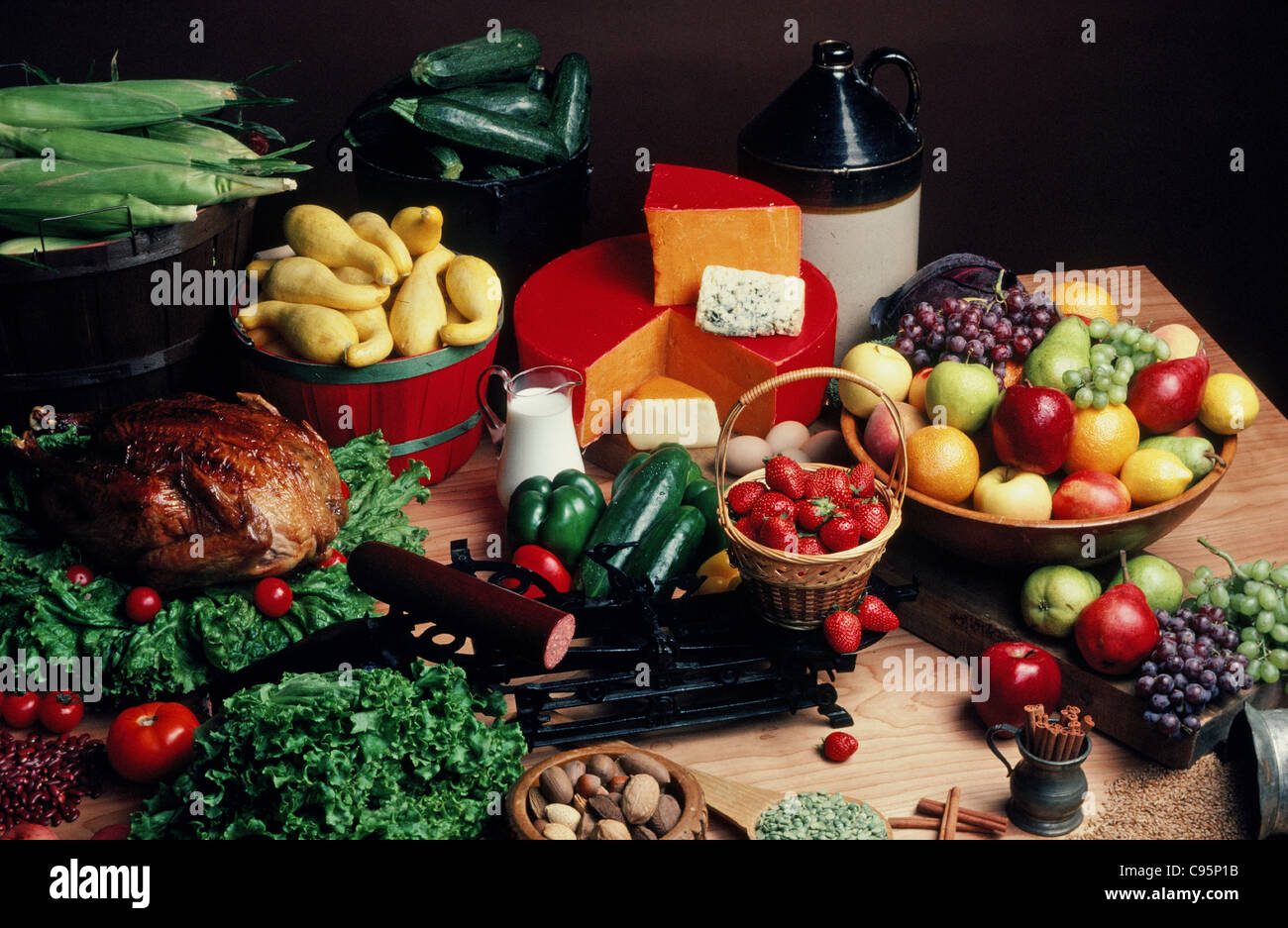 Huge feast of fruit, vegetables, turkey, meat and nuts Stock Photo Alamy