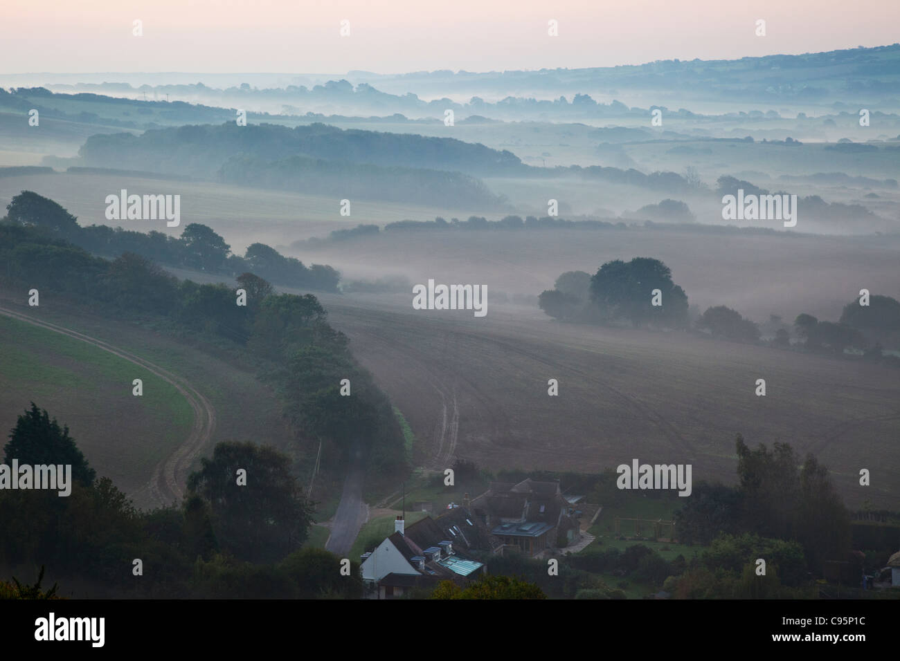 England, Dorset, Dawn over The Isle of Purbeck near Corfe Castle Stock Photo