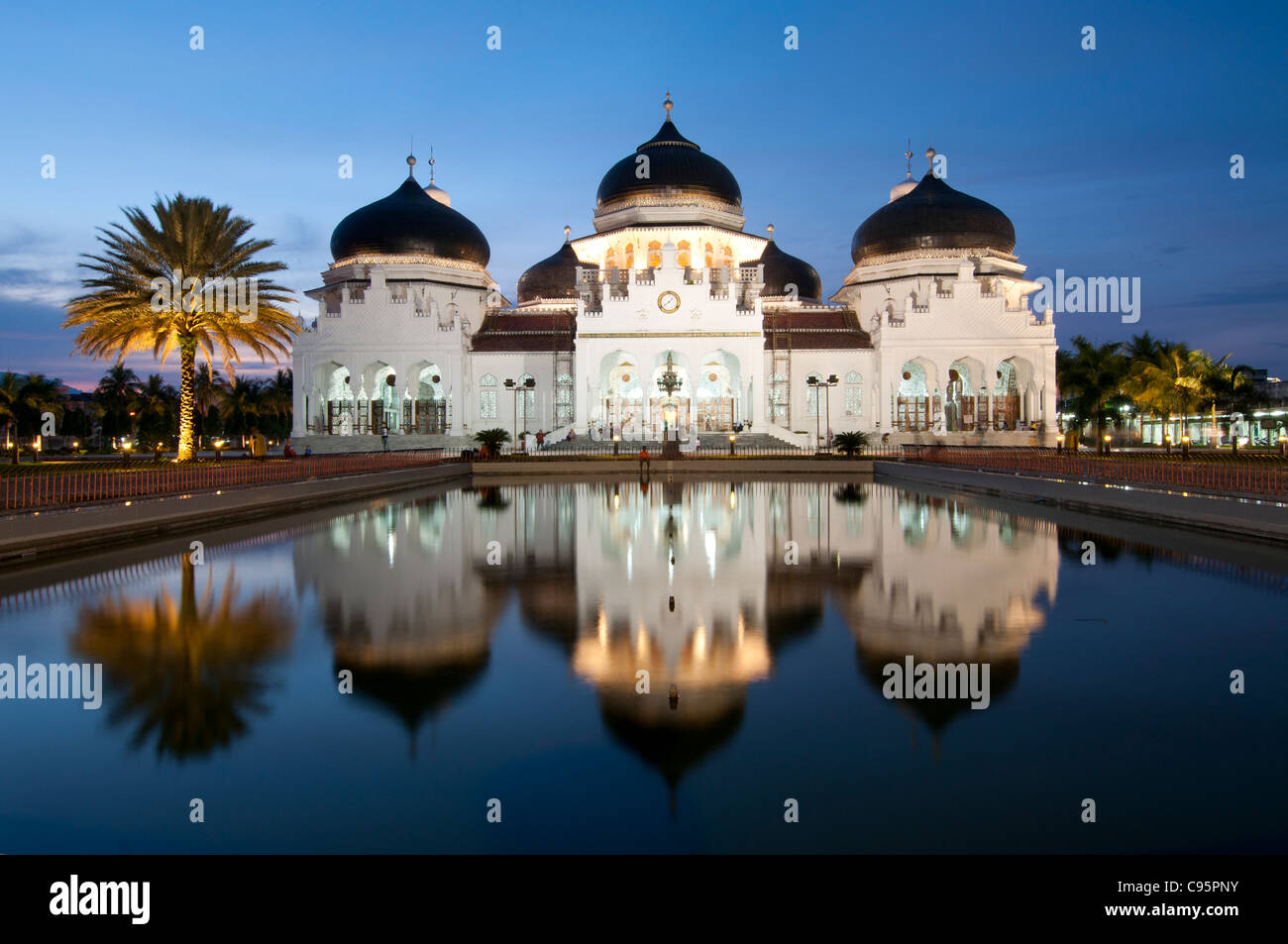 Baiturrahman Mosque, Banda Aceh, Sumatra, Indonesia at sunset Stock Photo