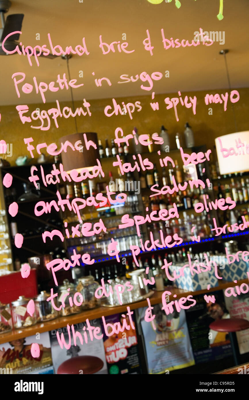 Specials menu written on a mirror in Bar Open on Brunswick Street in