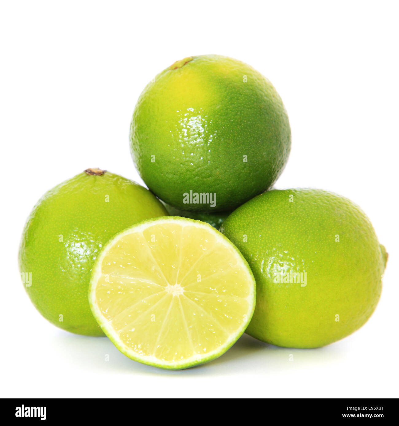 Pile of fine ripe limes. All on white background. Stock Photo