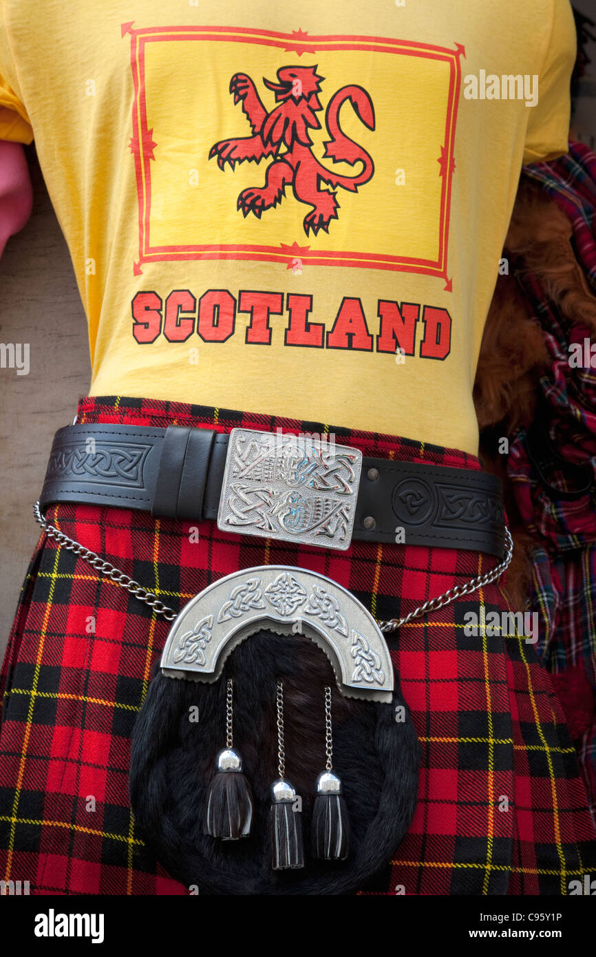 Scotland, Edinburgh, The Royal Mile, Souvenir Shop Display of Scottish T-shirt and Kilt Stock Photo