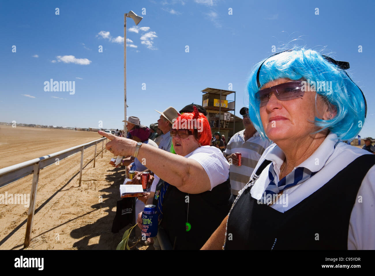 Race goers in costume dress at the annual Birdsville Races. Birdsville