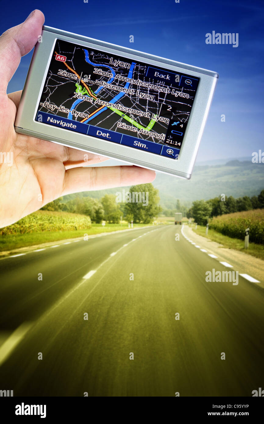 GPS Vehicle navigation system in a man hand Stock Photo Alamy