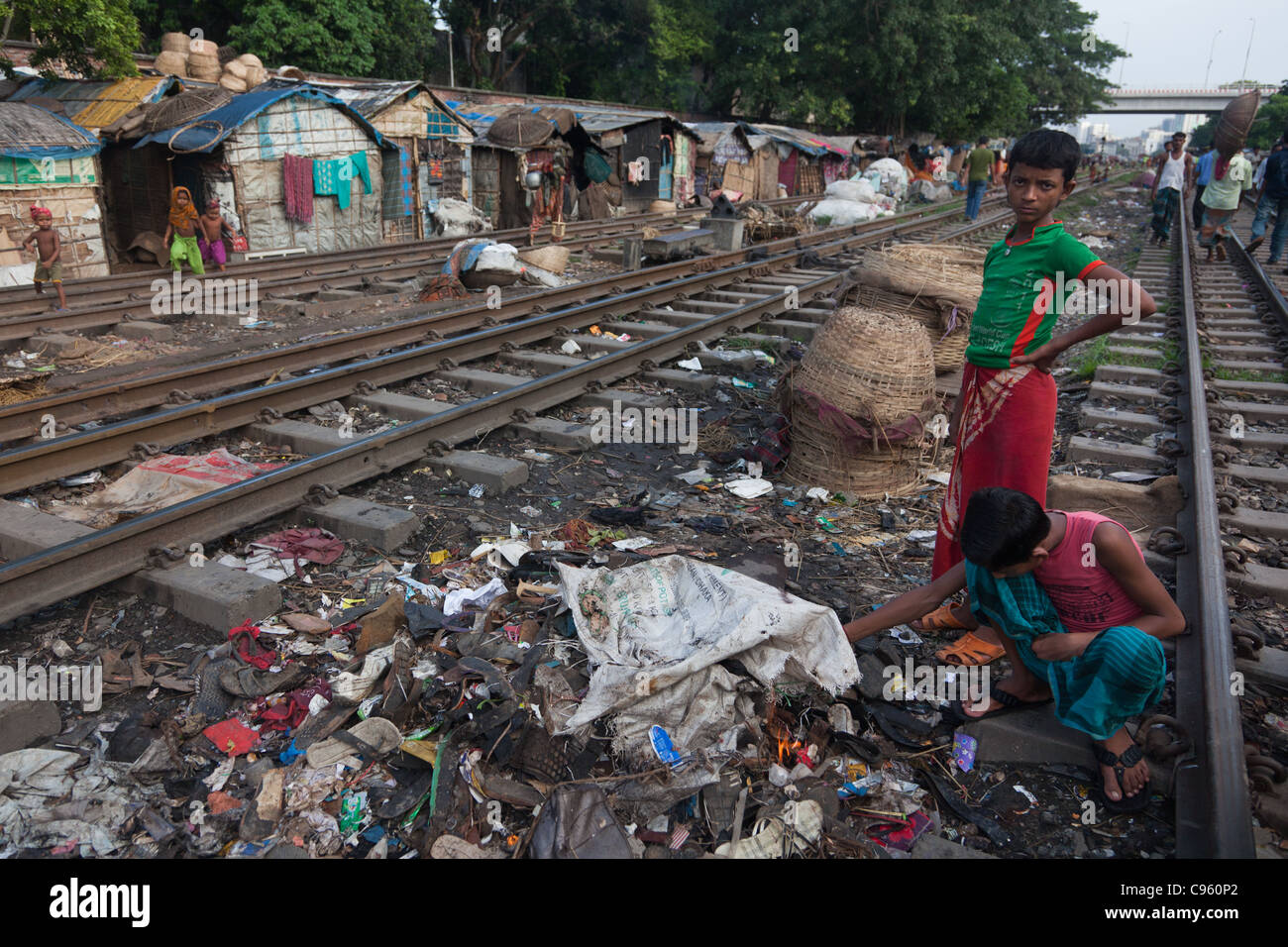 Life in Tejgaon slum in Dhaka. The slum is build along the train lines ...