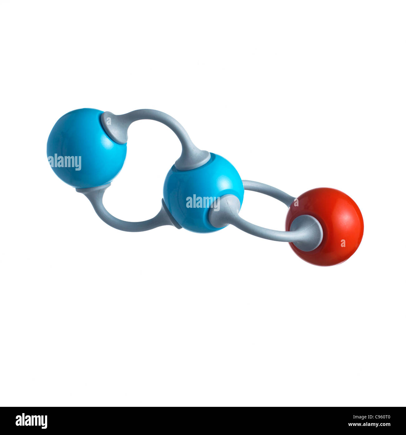Nitrous oxide molecule. Atoms are represented as spheres and are colour-coded: nitrogen (blue) and oxygen (red). Stock Photo