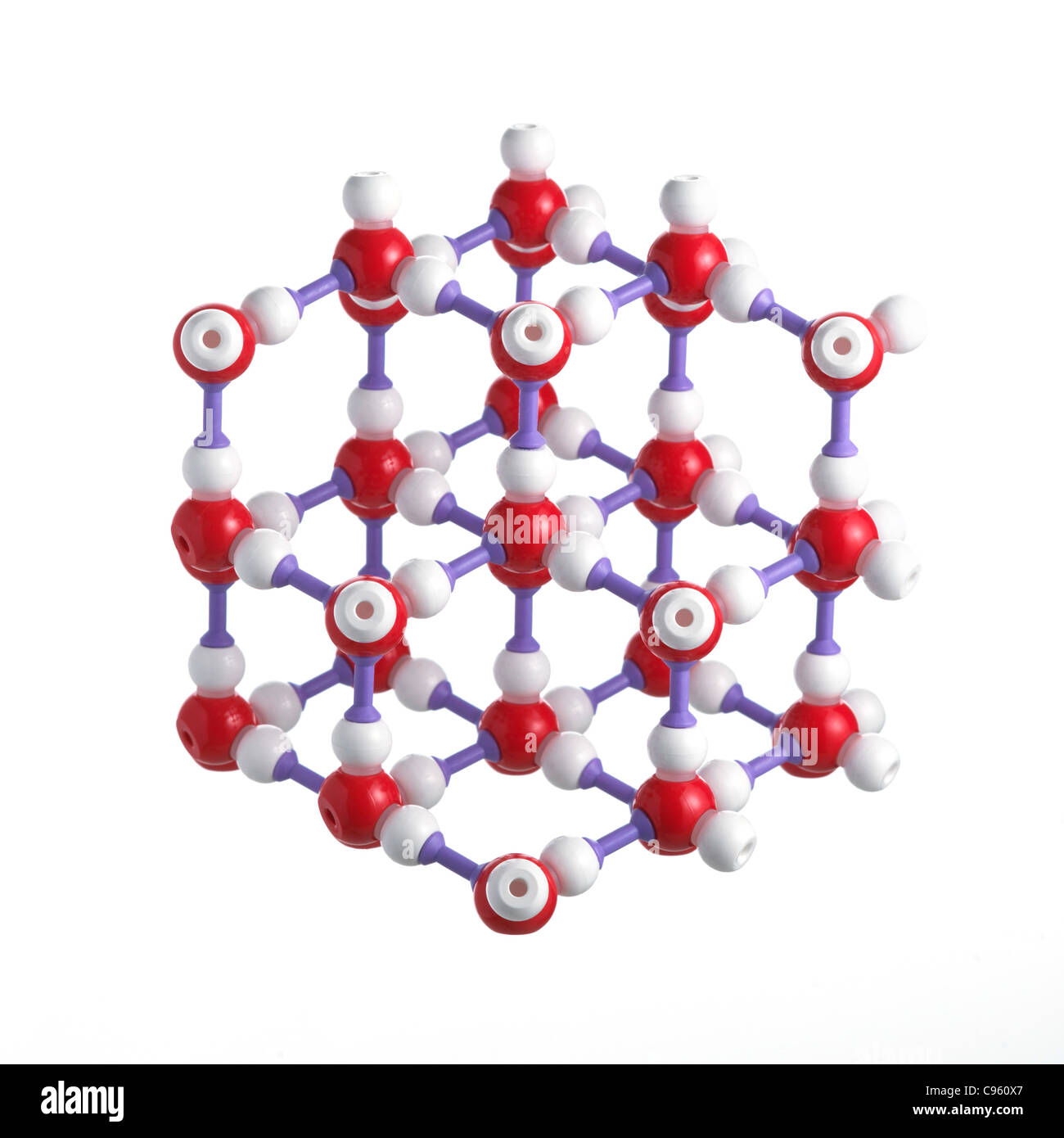 Ice lattice. Atoms are represented as spheres and are colour-coded: oxygen (red) and hydrogen (white). Stock Photo