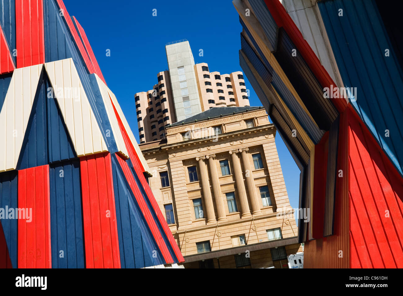 Looking through colourful sculptures of the Adelaide Festival Centre to Parliament House - Adelaide, South Australia, AUSTRALIA Stock Photo