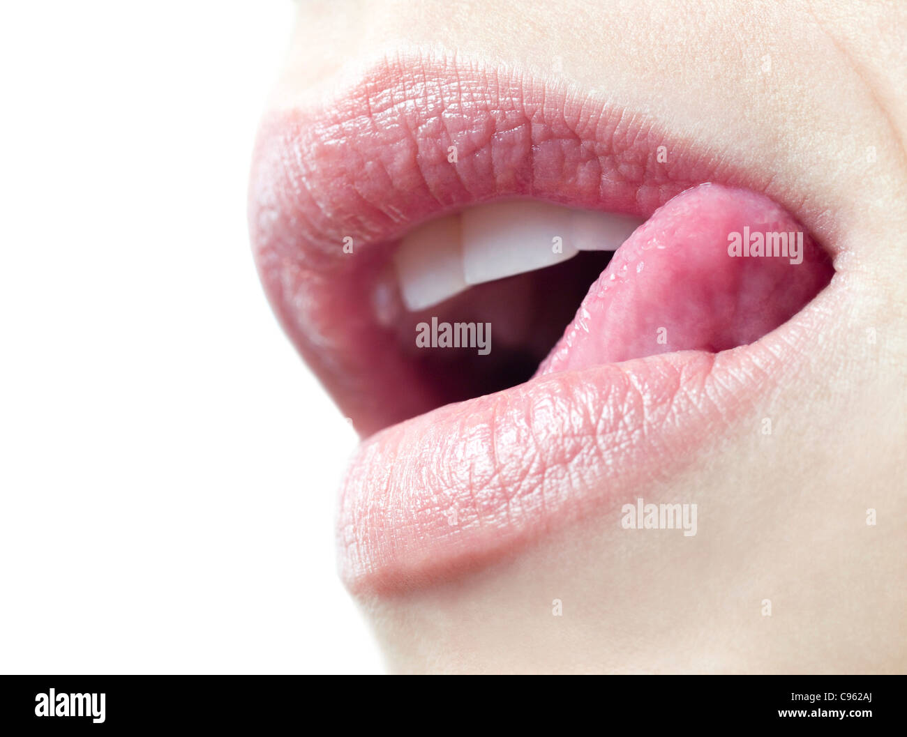 Woman licking her lips. Stock Photo