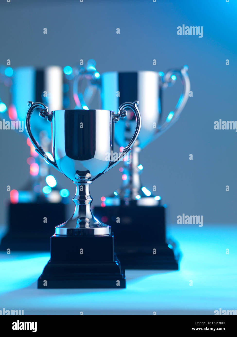 Three silver trophies hires stock photography and images Alamy