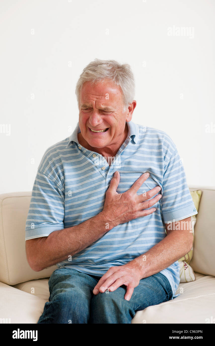 Man having a heart attack Stock Photo - Alamy