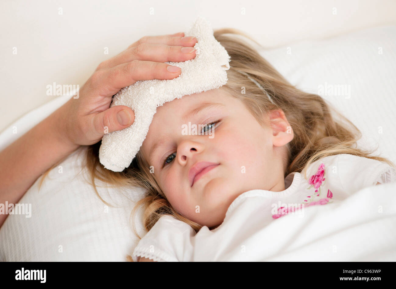 soothing-a-child-s-fever-stock-photo-alamy