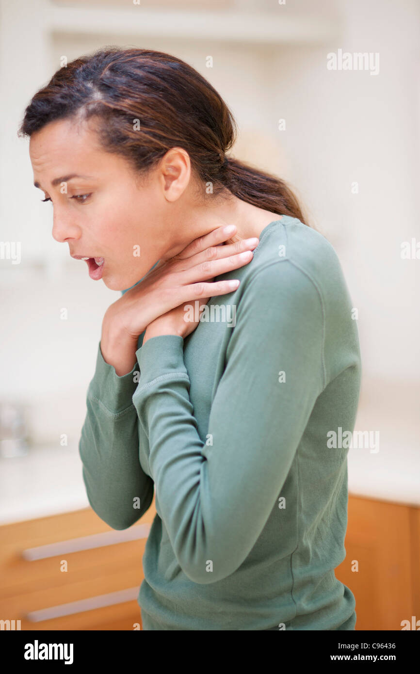 Woman choking. Stock Photo