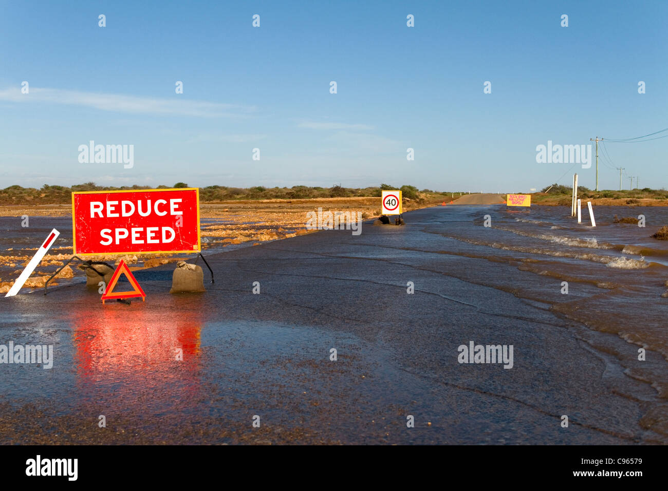 Road that has been washed away during a flood, Northwest Australia Stock Photo